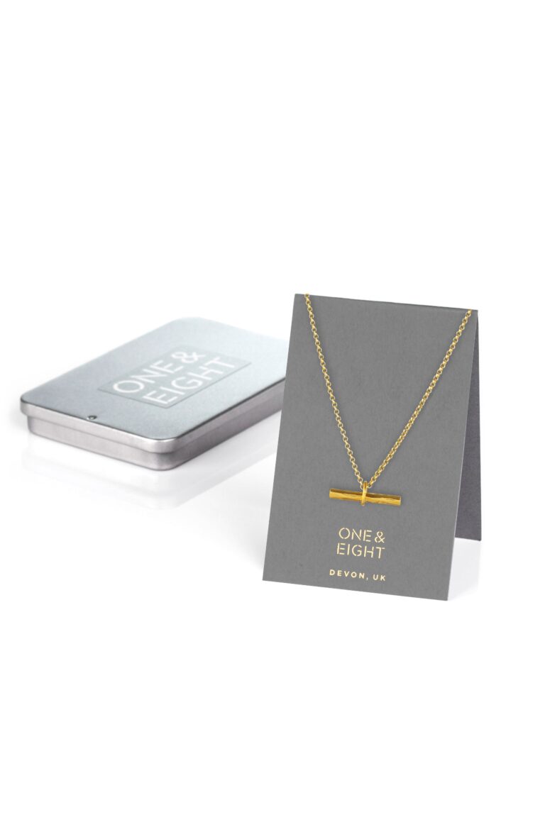 Willow Gold Bar Necklace on card backing with reusable tin