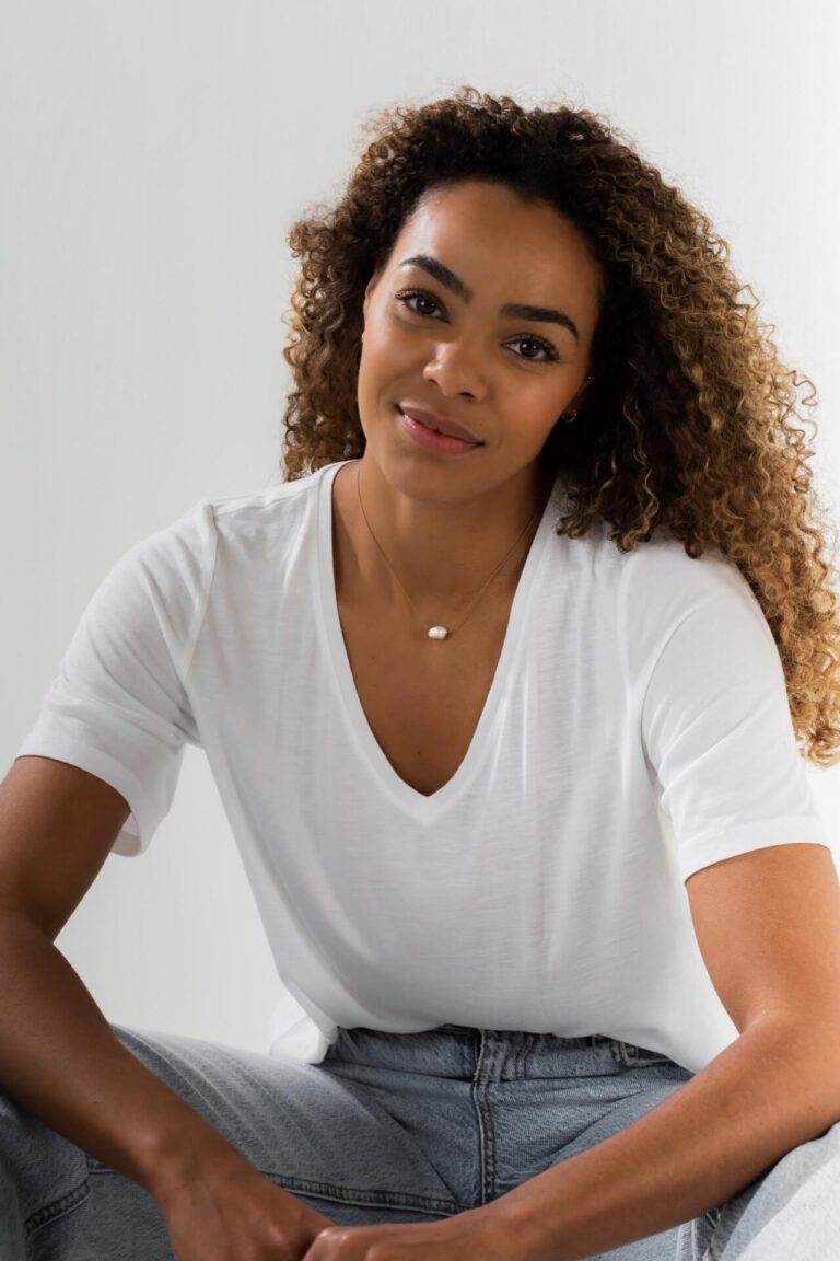 Pearl Gold Cord Necklace worn by model in white t-shirt