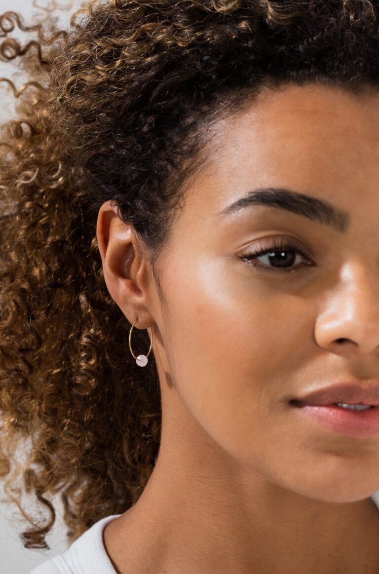 Model wears Rose Quartz Gold Hoop Earrings