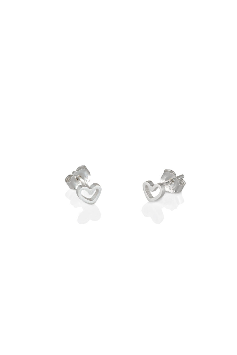 Recycled silver heart shaped stud earrings on white background