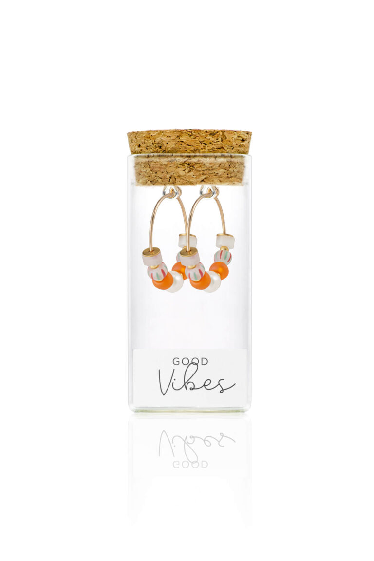 Beach Break Glass Bead Hoop Earrings in a glass bottle with cork lid