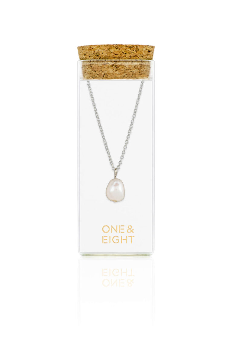 Silver Pearl Necklace in a glass bottle with cork lid