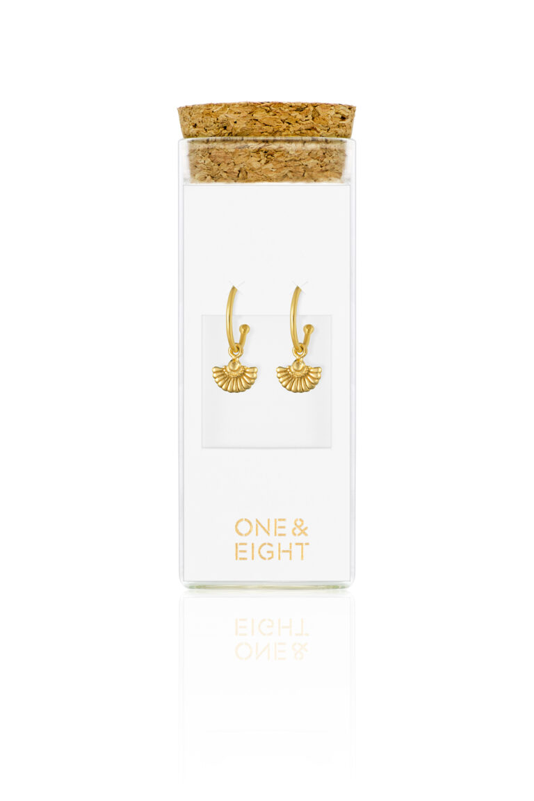 Gold Angel Fan Earrings in a glass bottle with cork lid