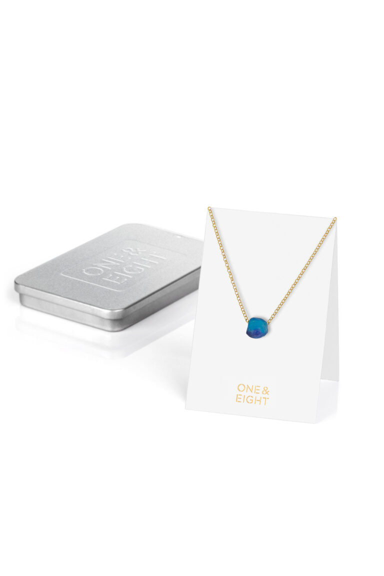 Marine Blue Glass Bead Necklace on white One & Eight branded card, with slim gifting tin in the background