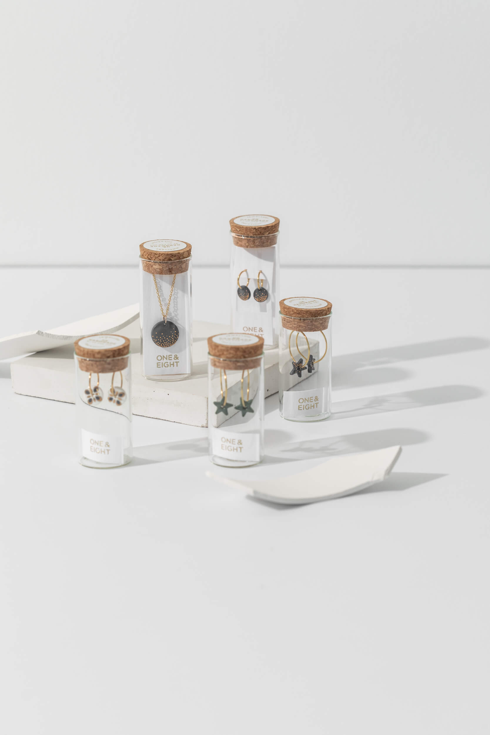 One-and-Eight-AW25-2727 2734 2730 2729 2733 Gold Earrings Gold Necklace Porcelain Forest Star Earrings Star Earrings Porcelain Midnight Mosaic Earrings Lifestyle 3 Mist Porcelain Cobalt